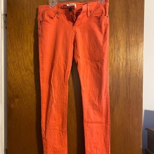 Orange skinny jeans